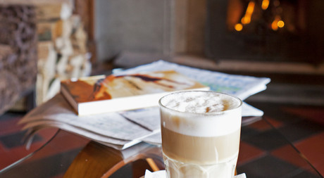Latte Macchiato and magazines at Hotel Castell in St. Moritz